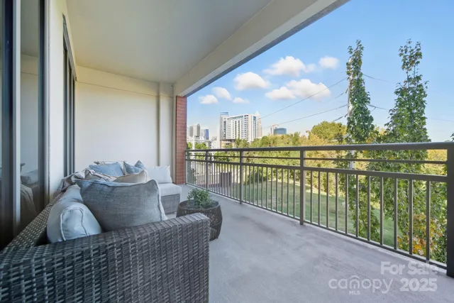 a balcony with furniture