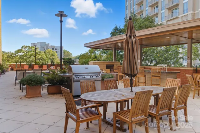 a view of an outdoor sitting area with furniture