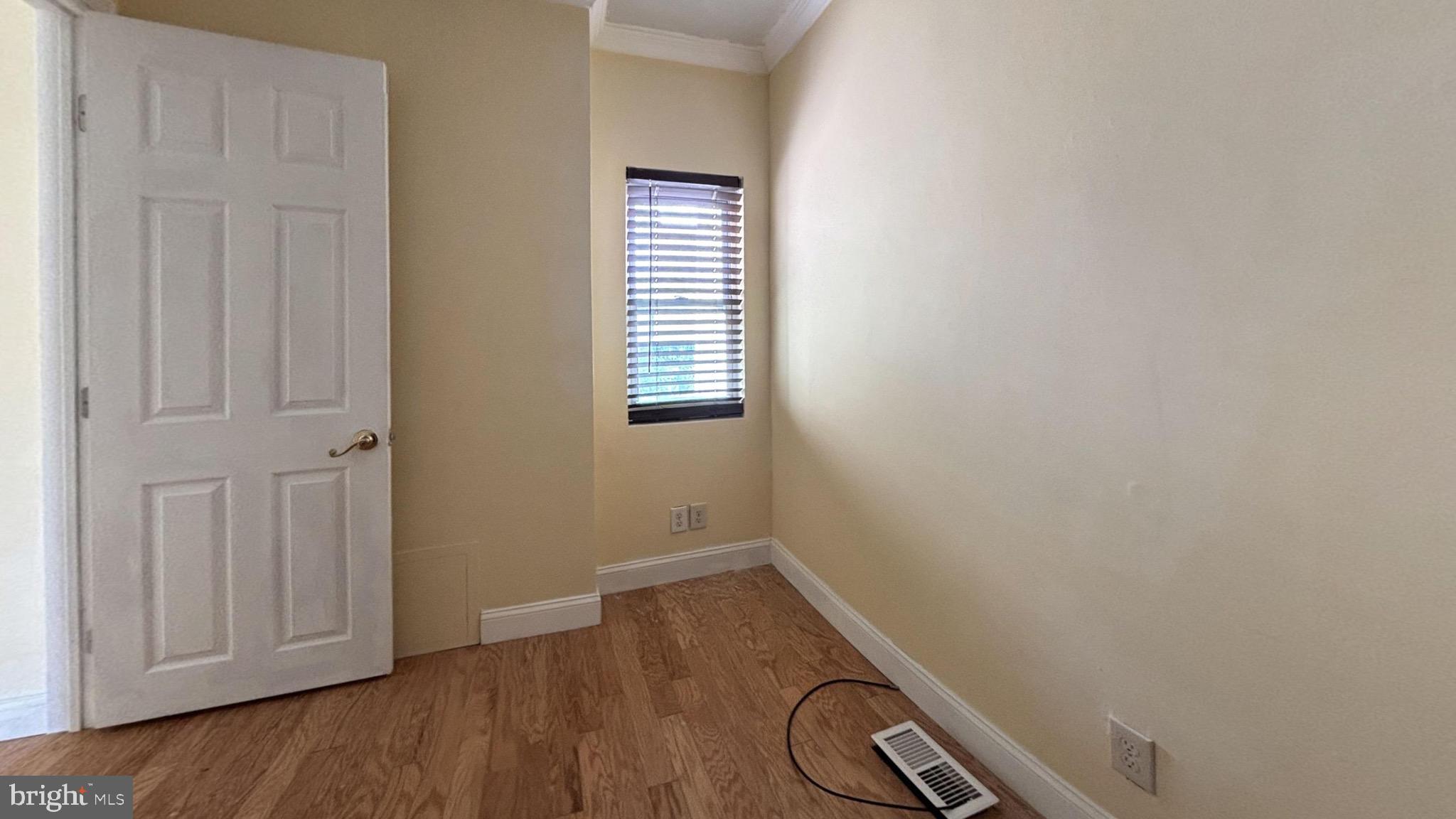 2338 Cross Street Philadelphia, PA 19146 - Photo 6 of 7 a view of a room with wooden floor and windows