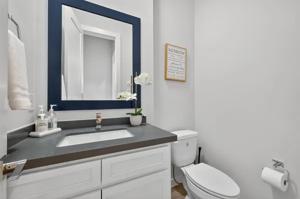 a bedroom with two beds and a large window