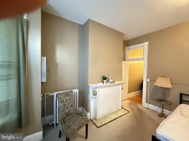 a view of a balcony with furniture