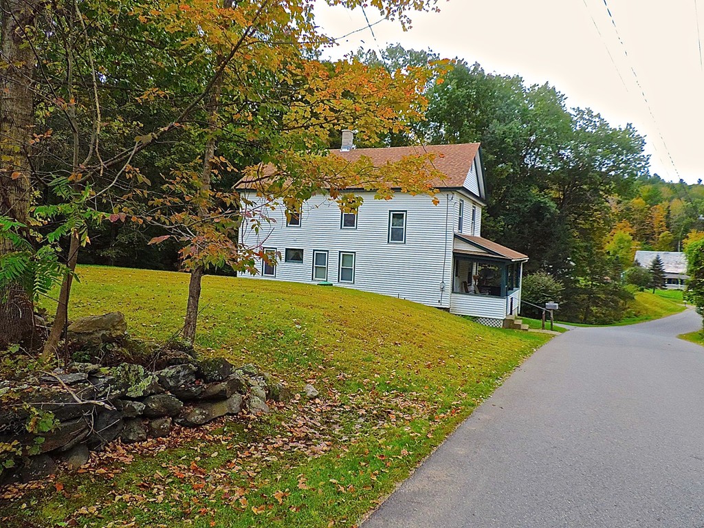 172 Call Road Colrain, MA 01340 - Photo 3 of 24 a view of a house with a yard