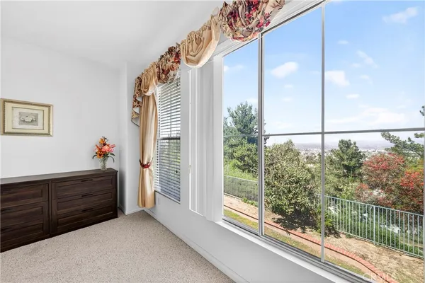 a view of a balcony and front door