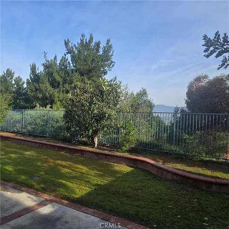 a view of a golf course with a garden