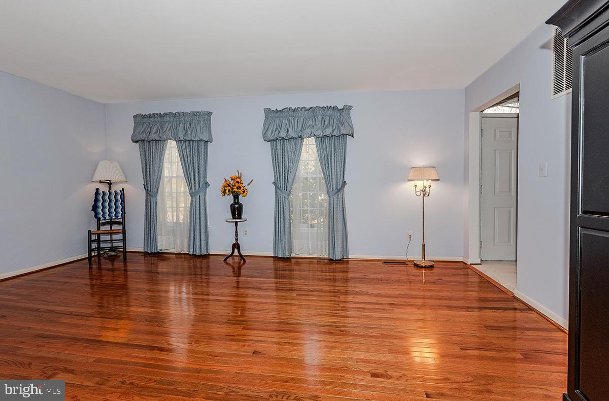 213 King James Road Upper Marlboro, MD 20774 - Photo 7 of 41 The formal living room with wood floors!