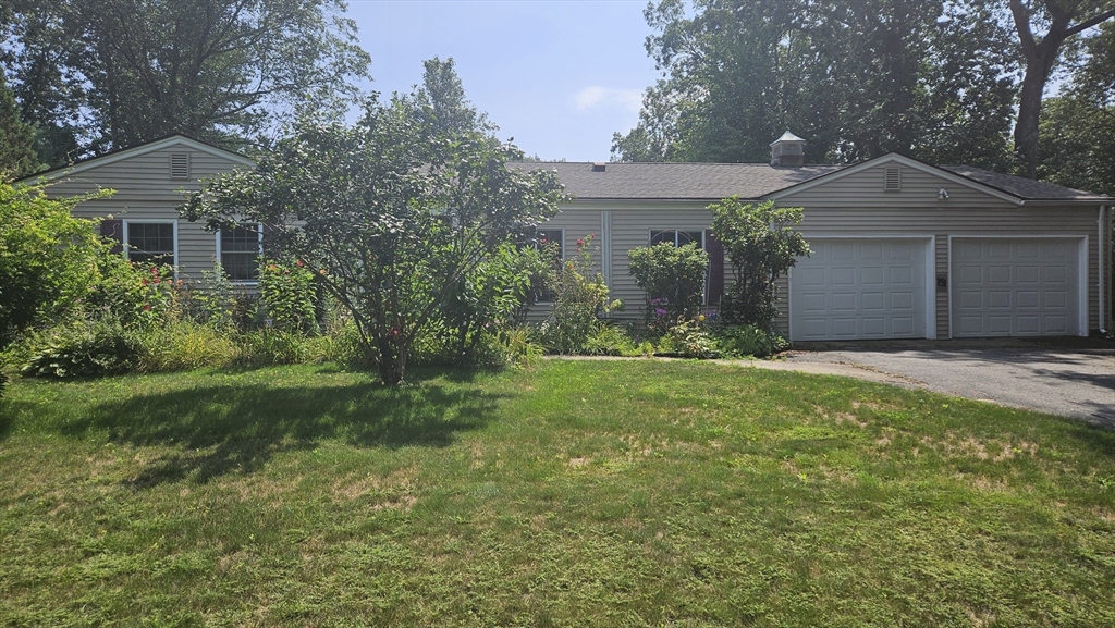 151 Wolf Swamp Road Longmeadow, MA 01106 - Photo 3 of 3 a front view of a house with a yard