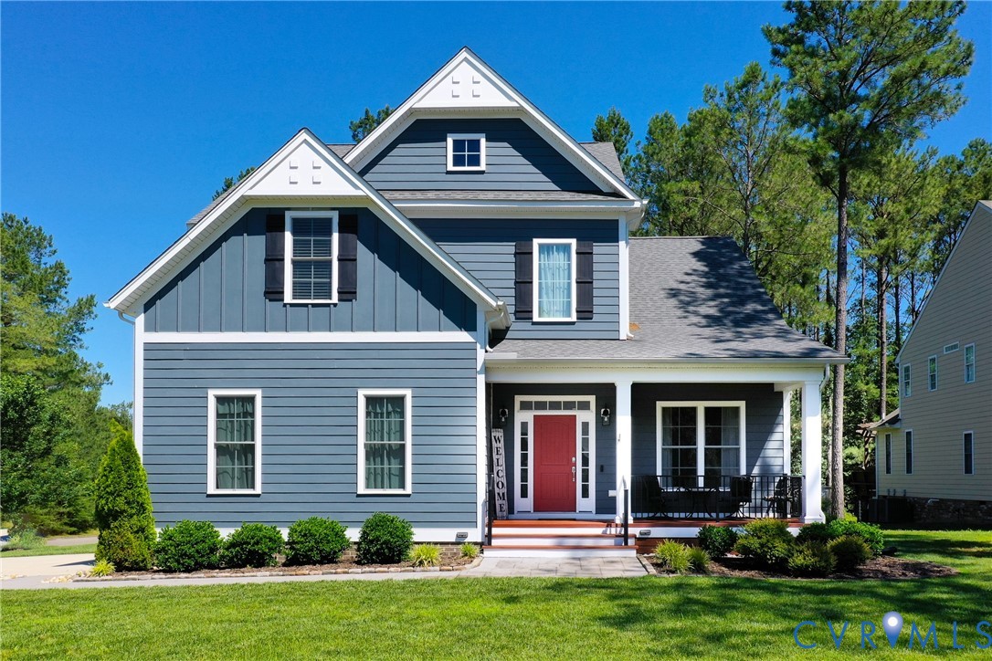 front view of a house with a yard
