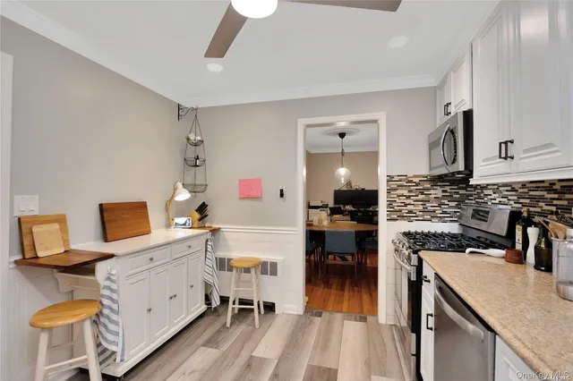 a bed room with furniture and a window