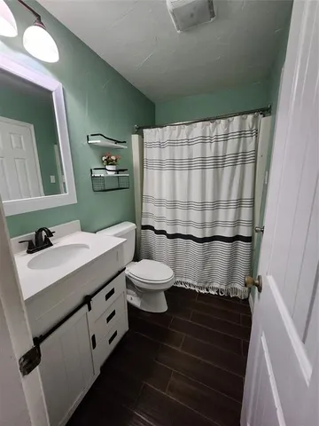 a garage with a car parked