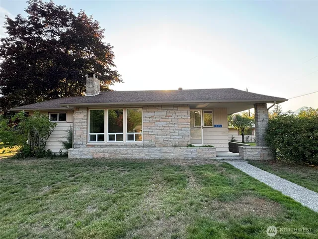 front view of a house with a yard