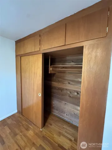 a view of a patio with wooden floor