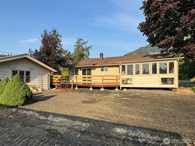 a front view of a house with a garage