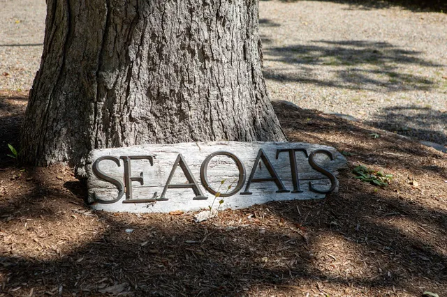 a spacious bedroom with a bed and a fireplace