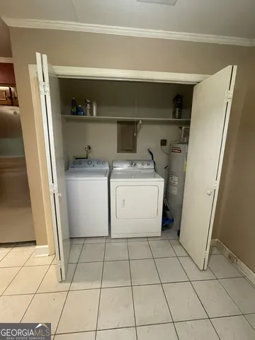 a utility room with a washer and dryer
