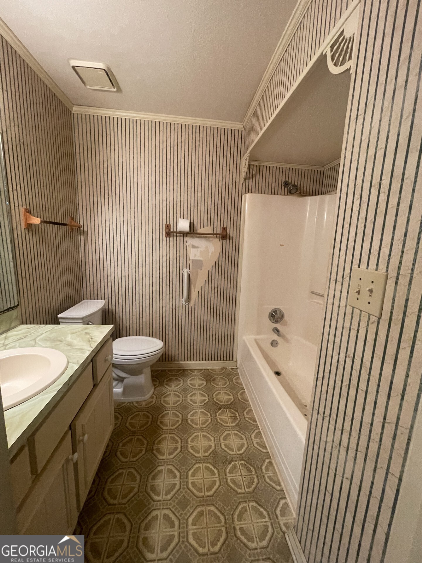 200 Cheyenne Drive LaGrange, GA 30240 - Photo 16 of 22 a bathroom with a granite countertop sink toilet and shower
