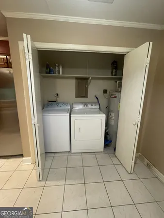 a utility room with a washer and dryer