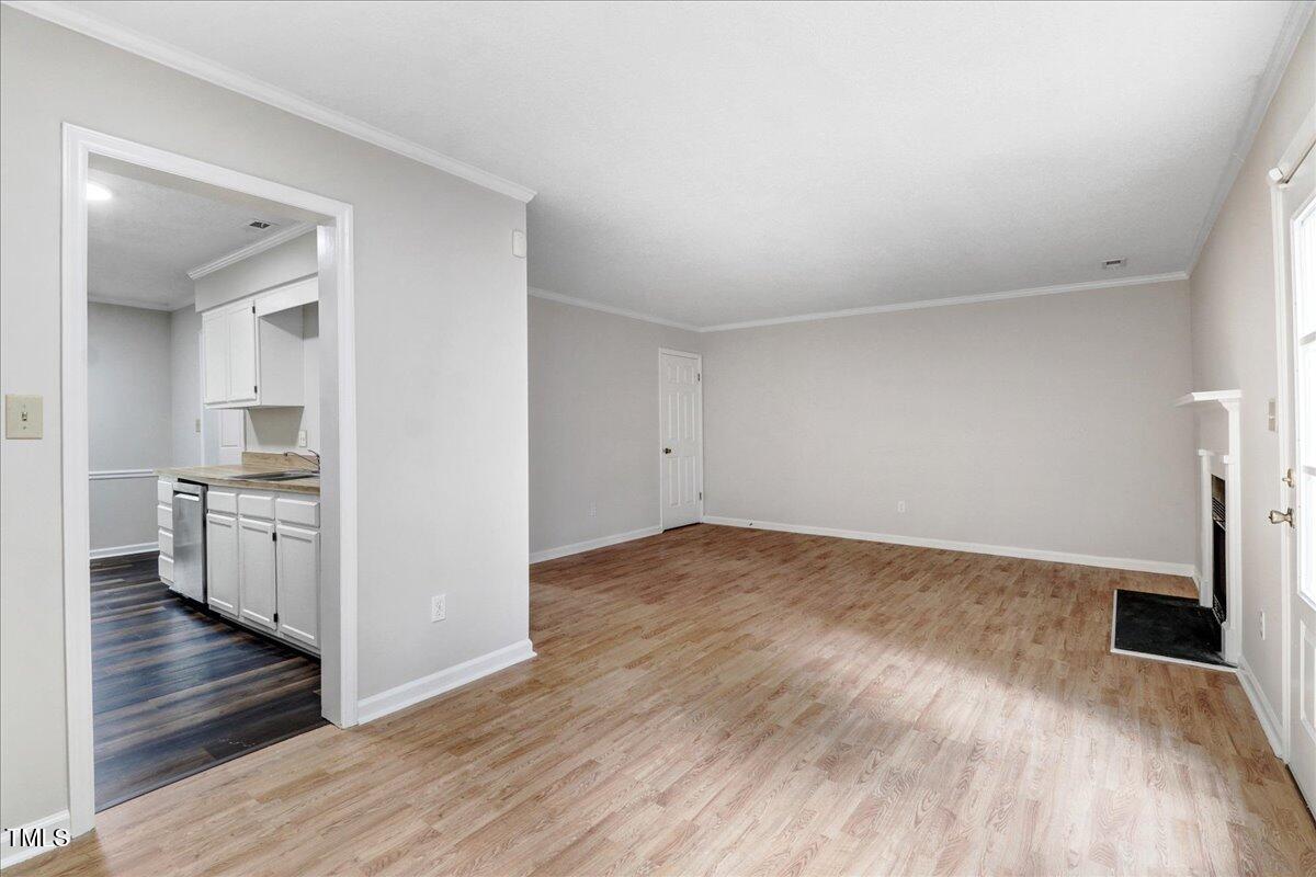 216 Bracken Court Raleigh, NC 27615 - Photo 10 of 27 Kitchen Left/Living Room