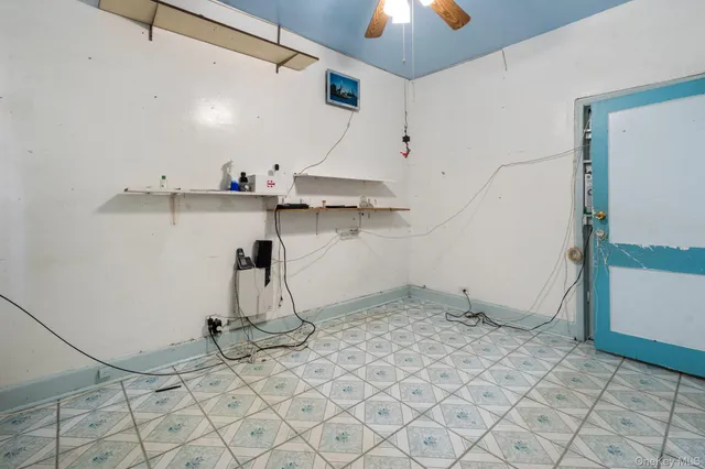 a view of a room with rack and wooden floor