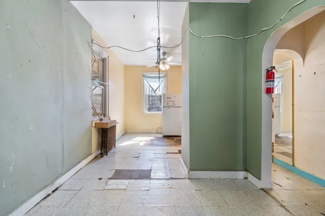 a view of entryway with bathroom