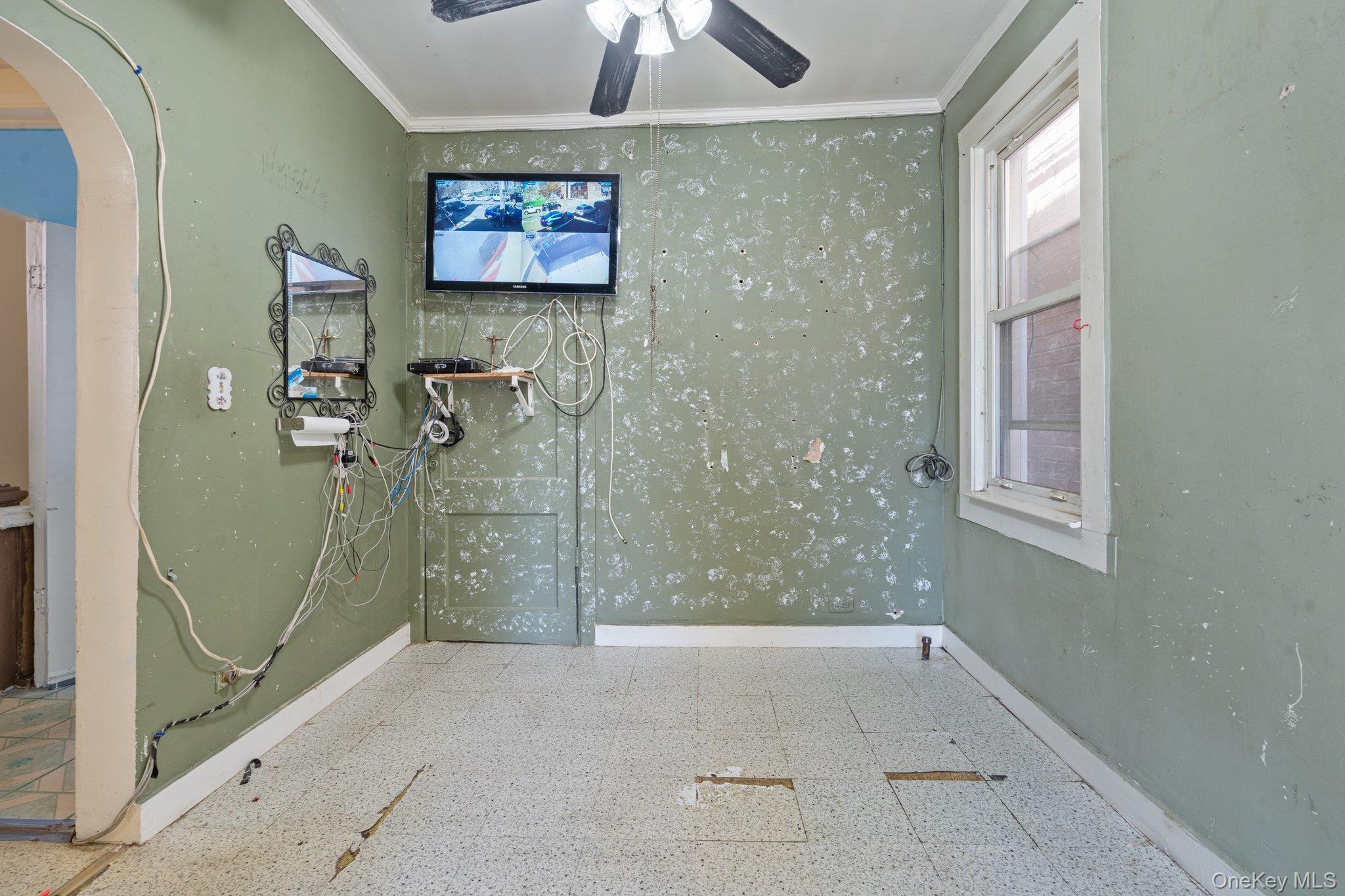 100-30 Martense Avenue Queens, NY 11368 - Photo 23 of 36 Bathroom featuring baseboards, ornamental molding, and a ceiling fan