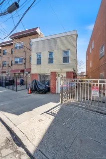 a view of a patio with table and chairs