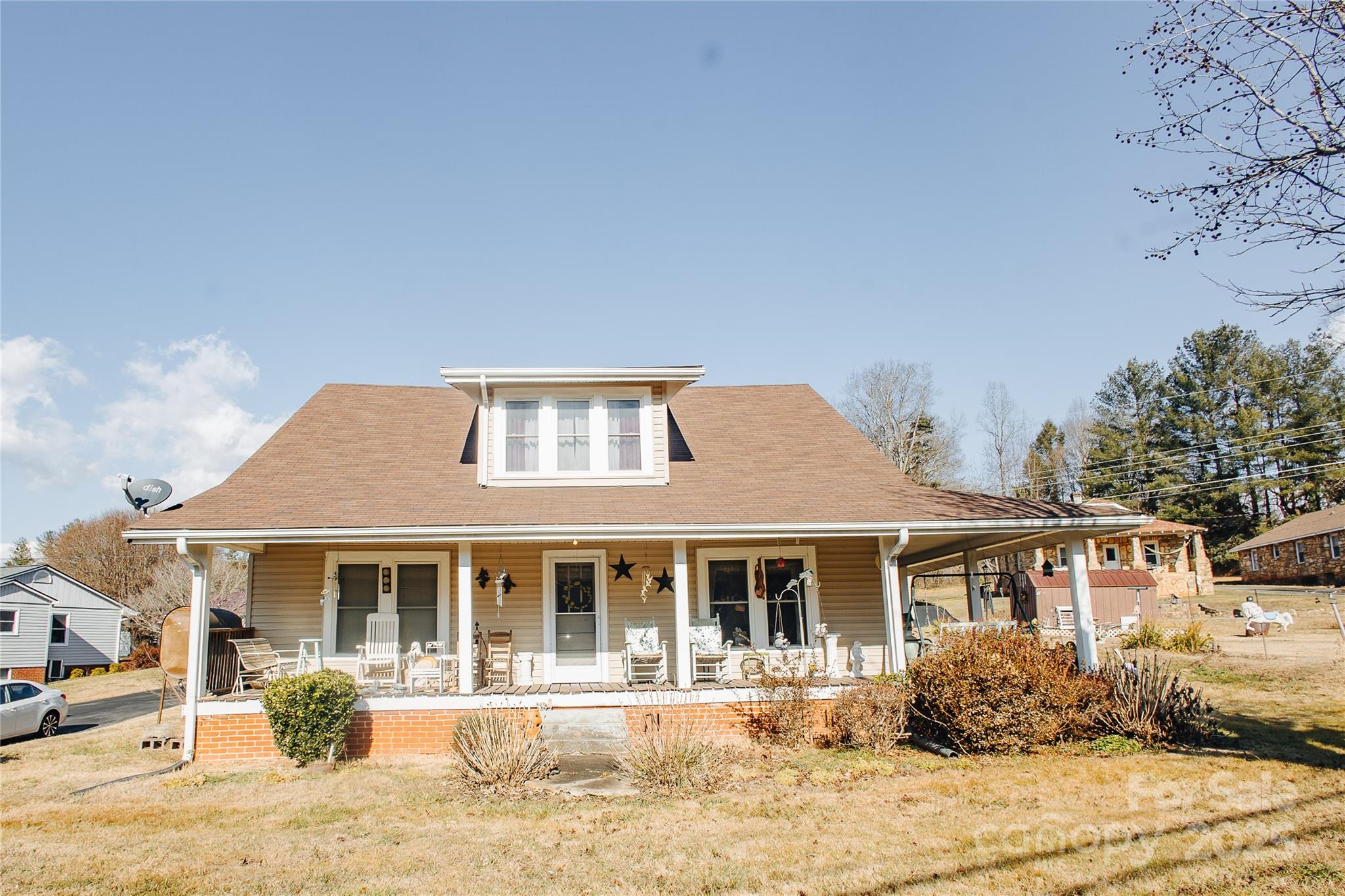 63 Clear Creek Road Marion, NC 28752 - Photo 2 of 38 a front view of a house with a yard