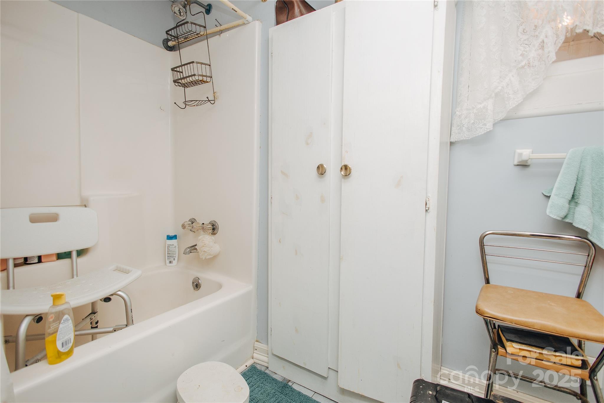 63 Clear Creek Road Marion, NC 28752 - Photo 24 of 38 a bathroom with a bathtub and sink