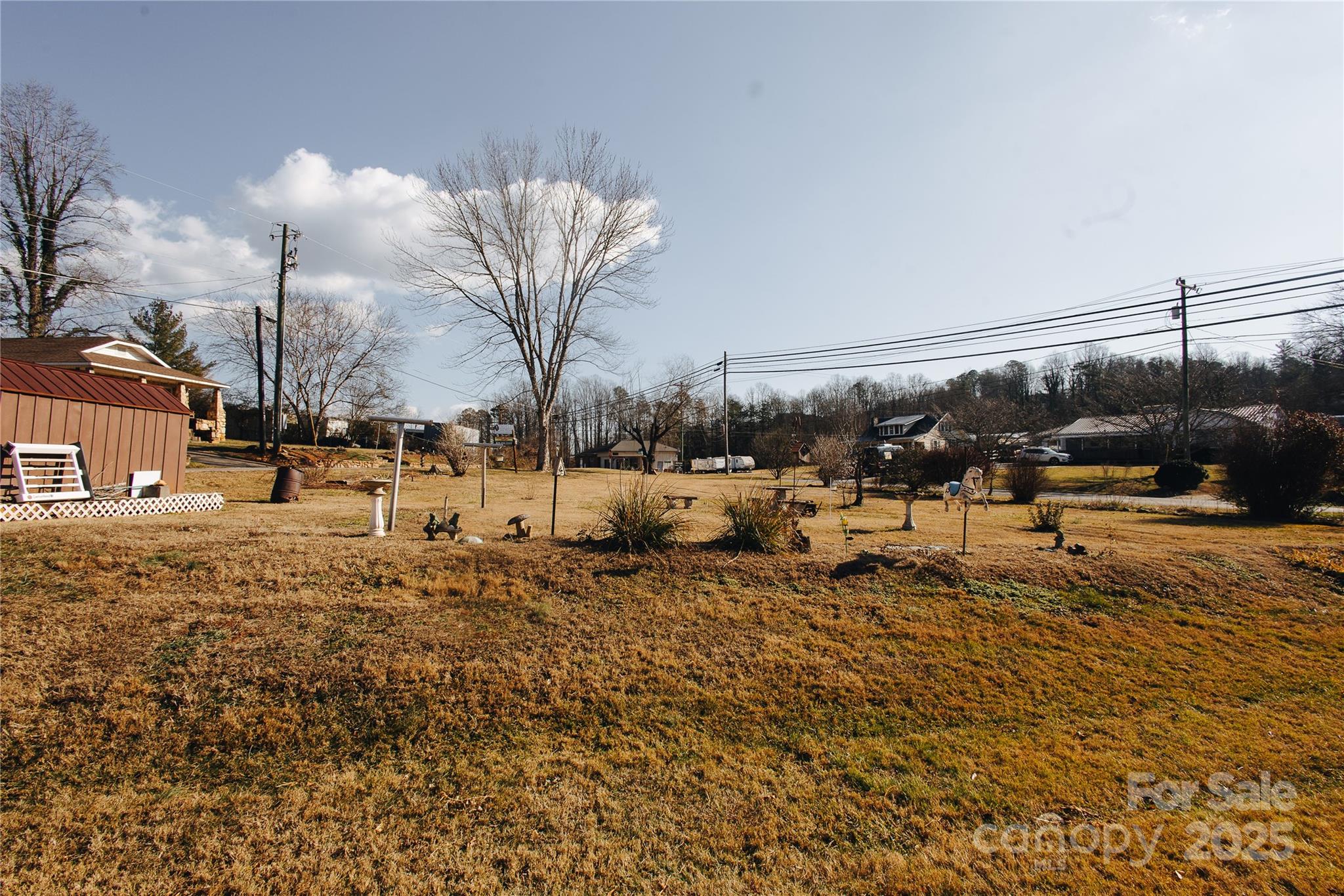63 Clear Creek Road Marion, NC 28752 - Photo 4 of 38 a row of residential houses with outdoor space