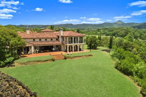 a view of a house with a big yard