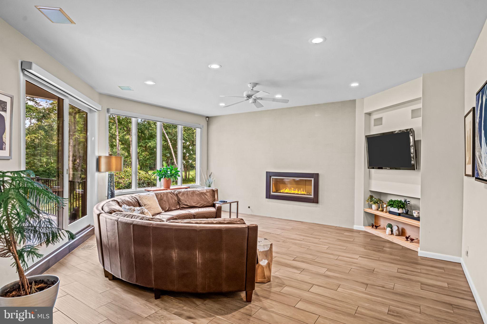 73 Bortons Road Marlton, NJ 08053 - Photo 43 of 99 a living room with furniture and a flat screen tv