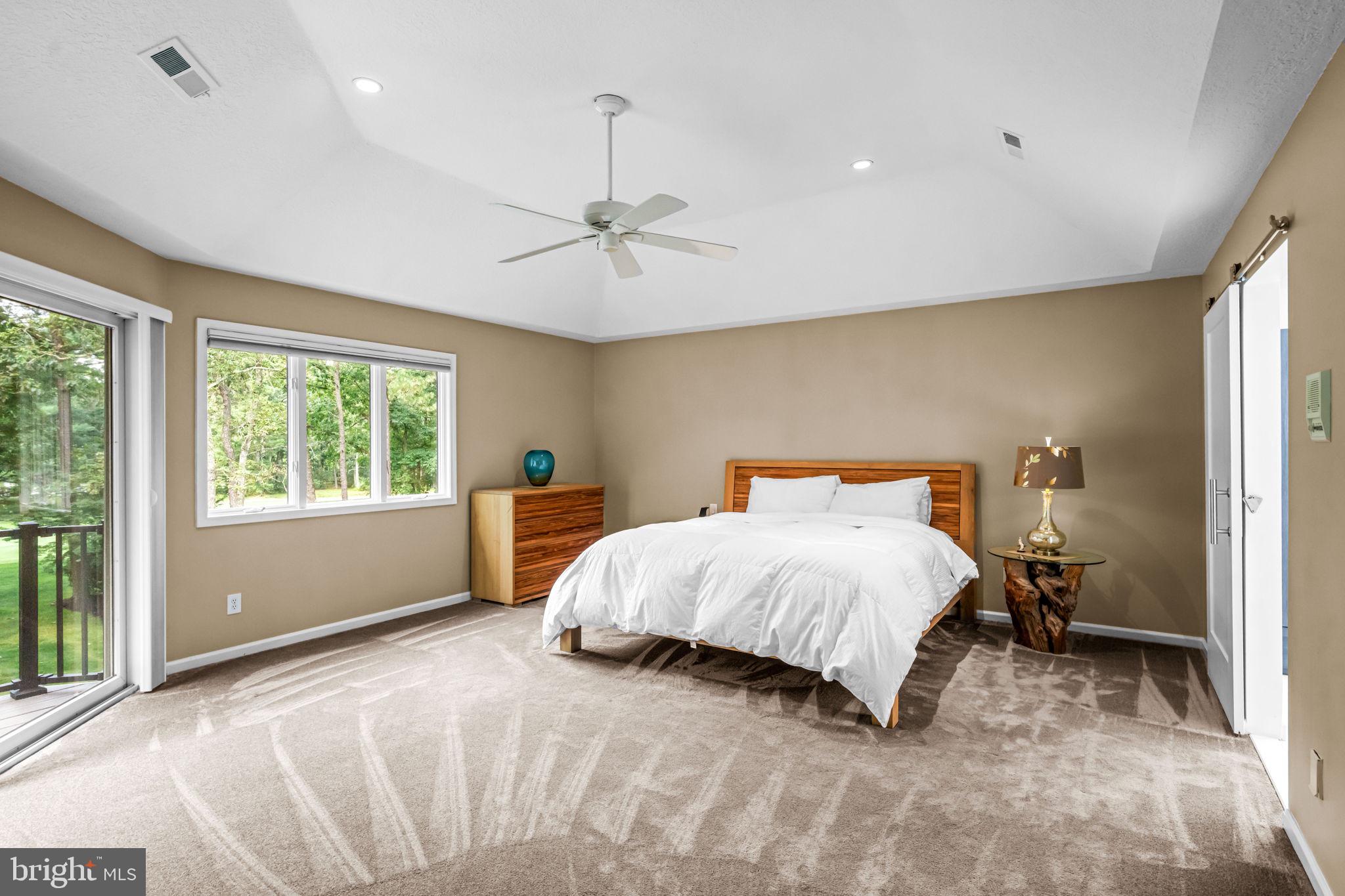 73 Bortons Road Marlton, NJ 08053 - Photo 52 of 99 a spacious bedroom with a bed and a window