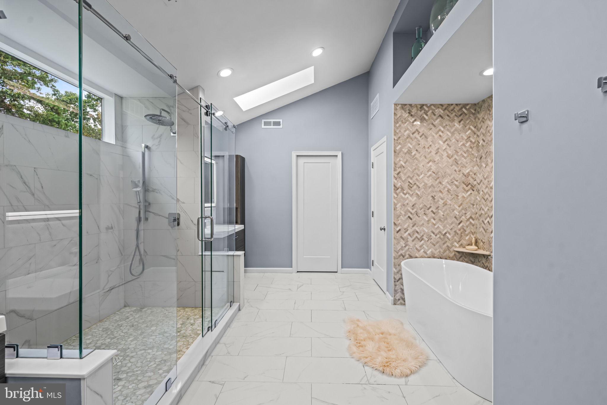 73 Bortons Road Marlton, NJ 08053 - Photo 57 of 99 a bathroom with a glass shower door