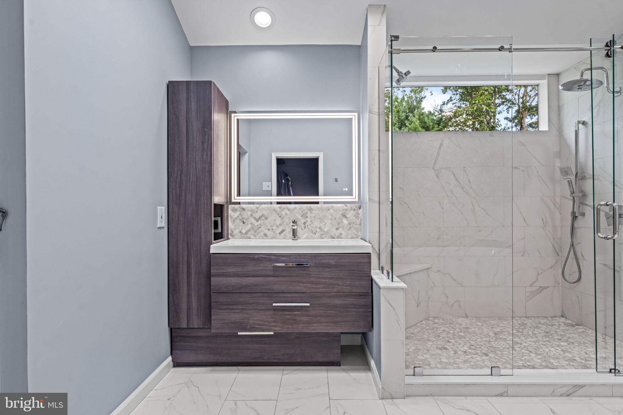 73 Bortons Road Marlton, NJ 08053 - Photo 62 of 99 a bathroom with a shower and a mirror