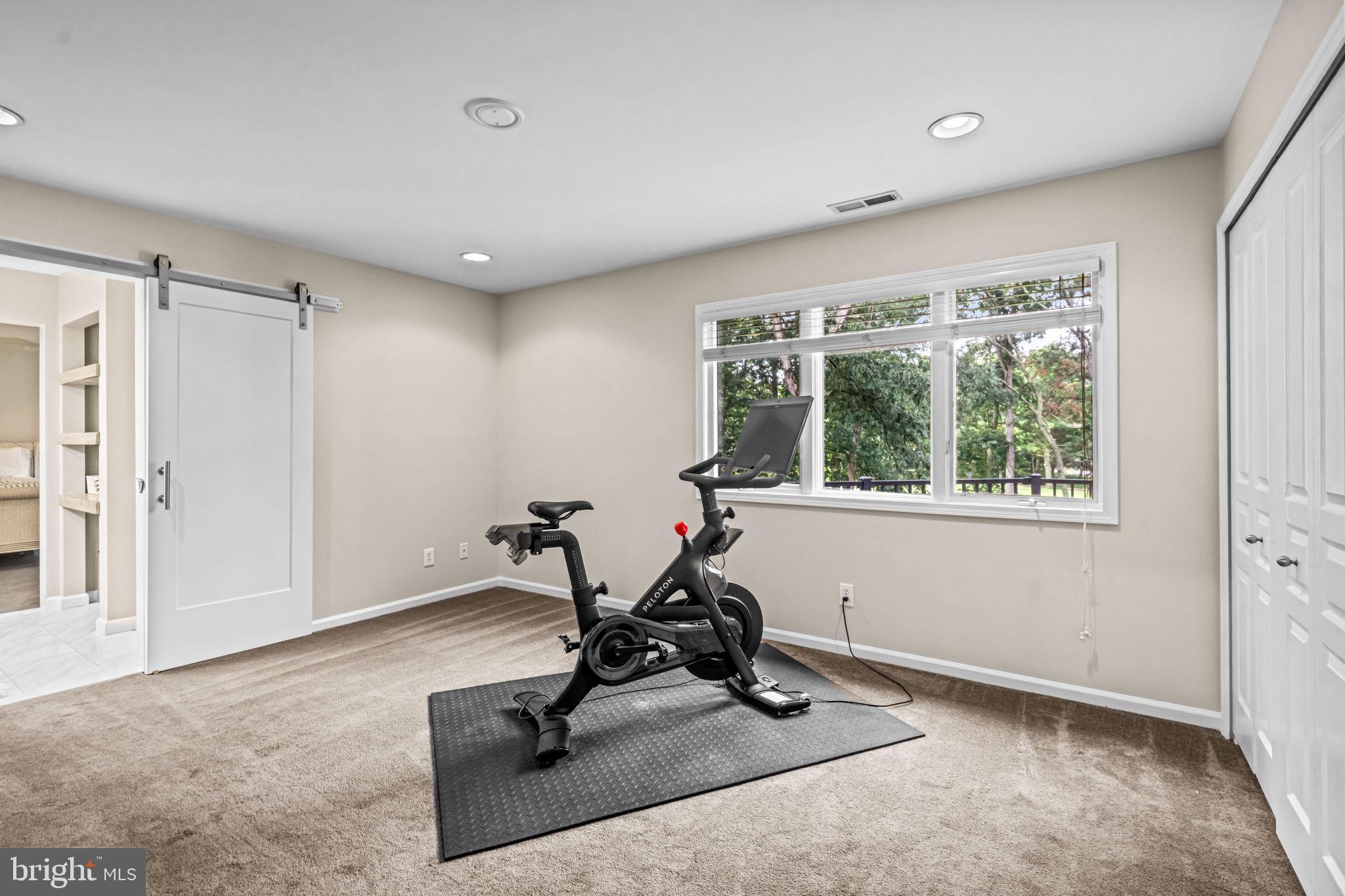 73 Bortons Road Marlton, NJ 08053 - Photo 68 of 99 a view of a room with gym equipment