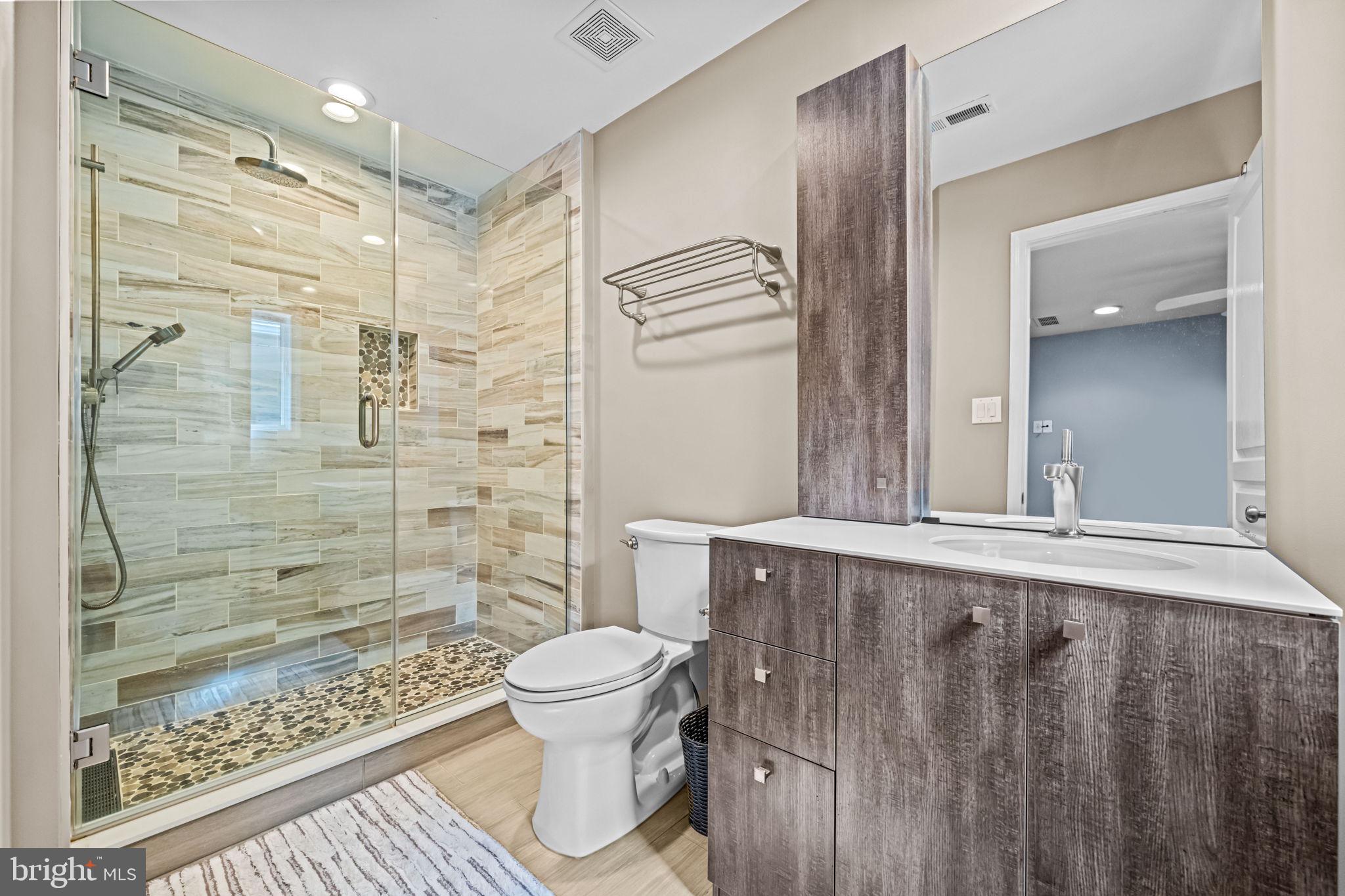 73 Bortons Road Marlton, NJ 08053 - Photo 72 of 99 a bathroom with a sink and a mirror