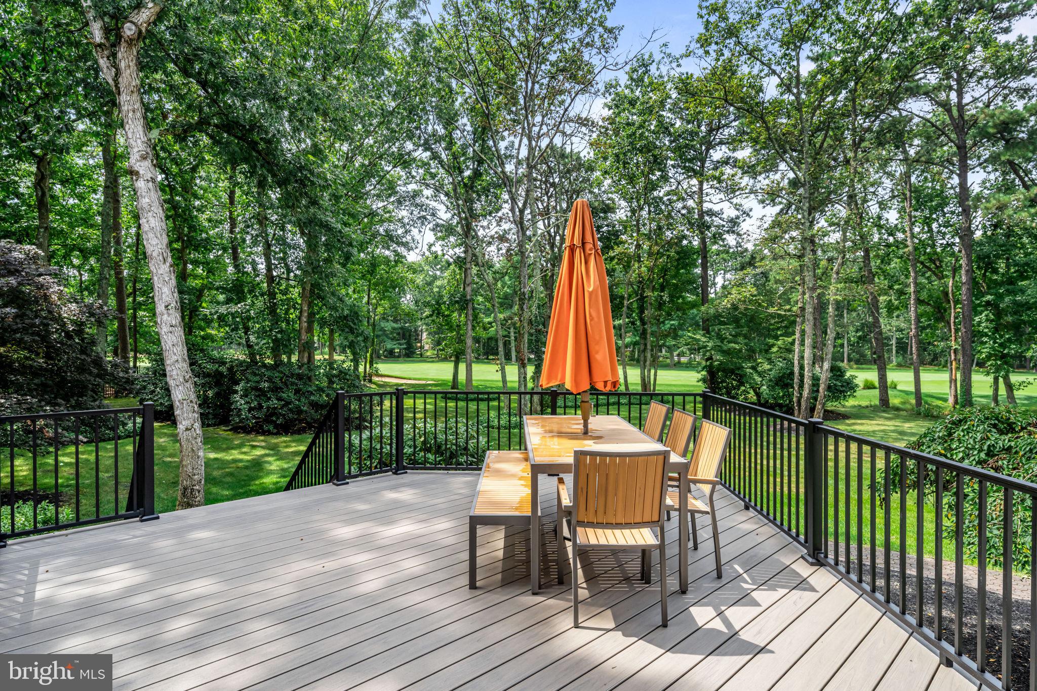 73 Bortons Road Marlton, NJ 08053 - Photo 83 of 99 a view of a chair and table on the wooden deck