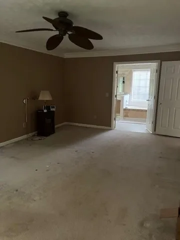 a view of a livingroom with a fan