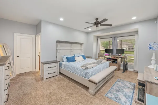 a living room with furniture and a area