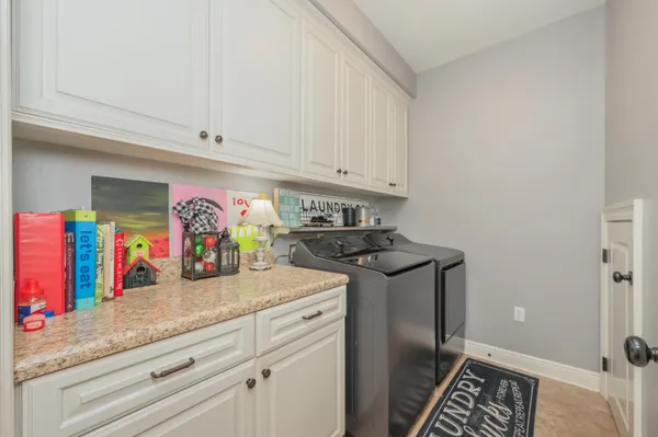 a view of a kitchen with appliances and cabinets
