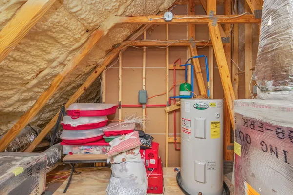 a view of a big yard with swimming pool and large trees