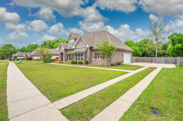 a view of building with garden