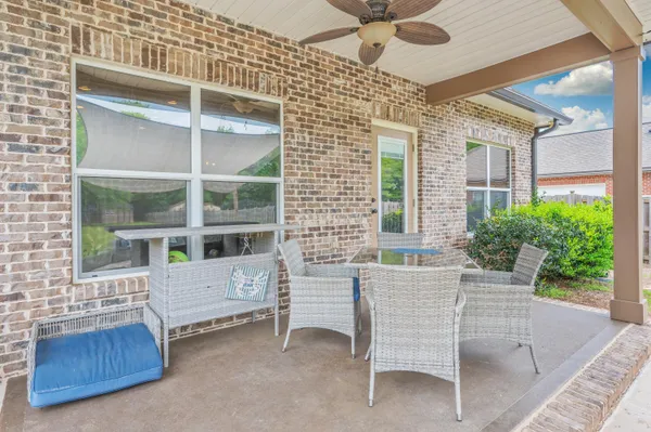 a view of wooden deck with a backyard