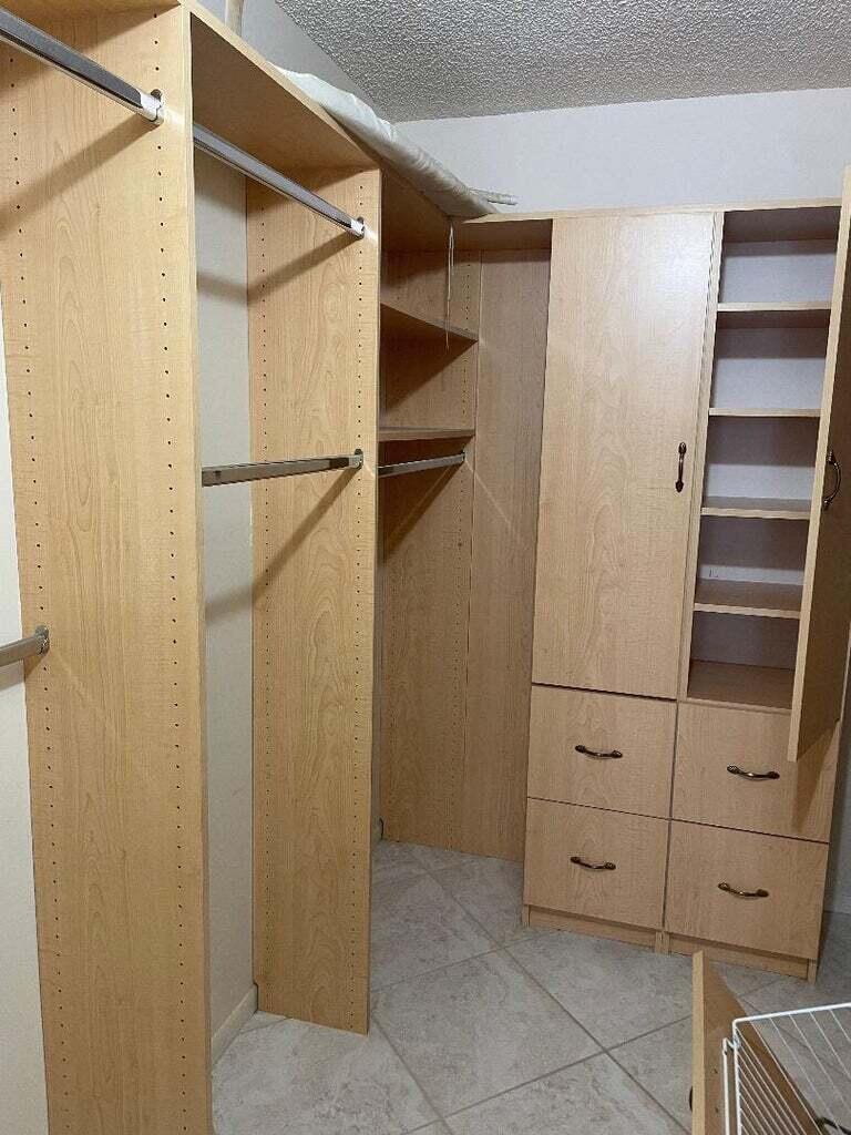 6300 Northwest 2nd Avenue, Unit 305 Boca Raton, FL 33487 - Photo 12 of 27 a view of walk in closet