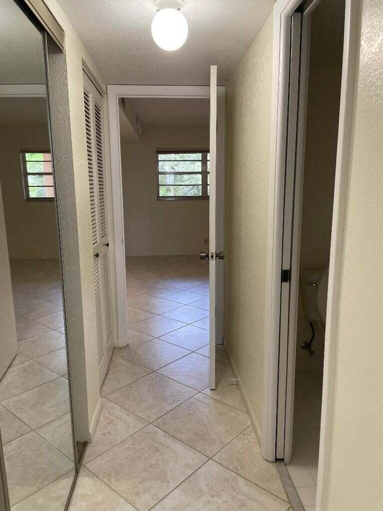 6300 Northwest 2nd Avenue, Unit 305 Boca Raton, FL 33487 - Photo 16 of 27 a view of an empty room and window