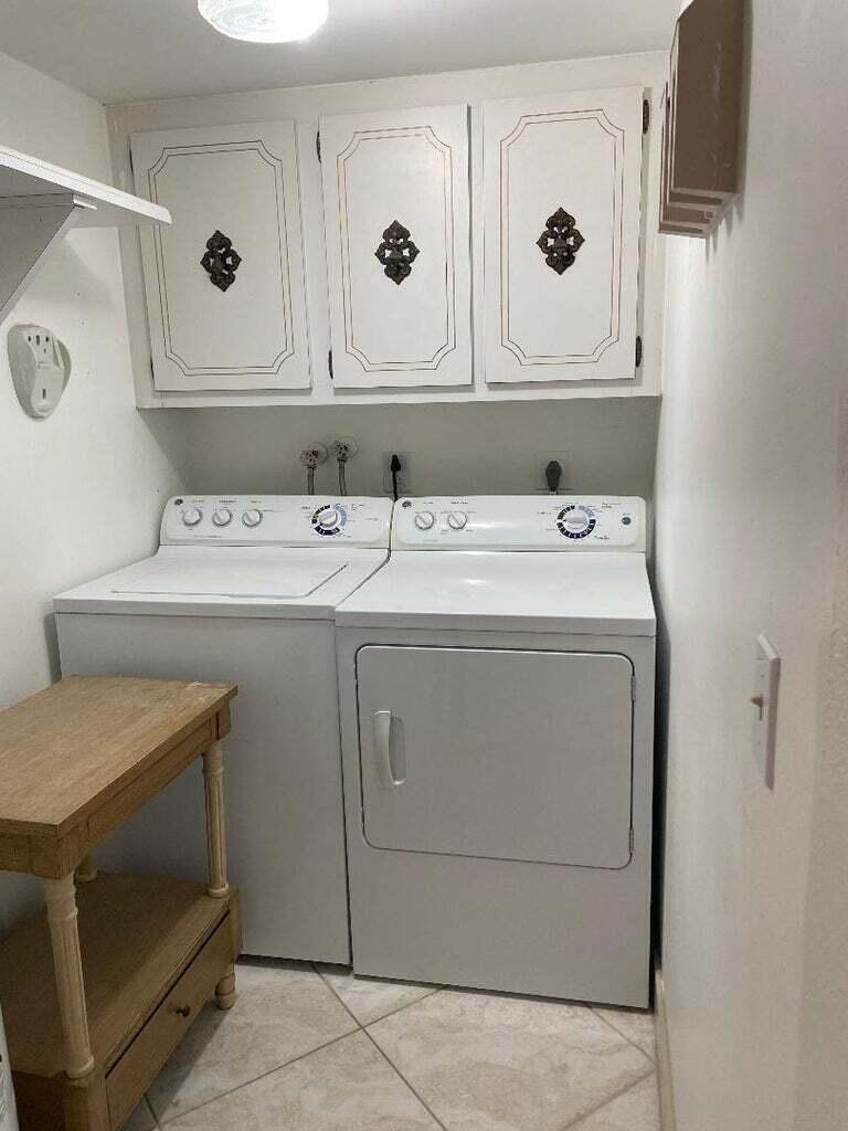 6300 Northwest 2nd Avenue, Unit 305 Boca Raton, FL 33487 - Photo 21 of 27 a utility room with dryer and washer