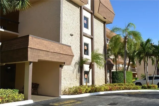 a front view of a building with street
