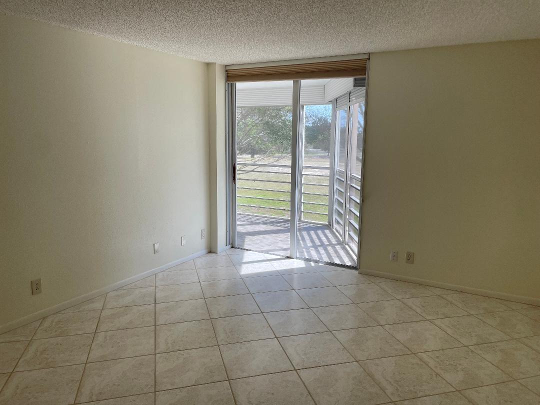 6300 Northwest 2nd Avenue, Unit 305 Boca Raton, FL 33487 - Photo 10 of 27 a view of an empty room with a window