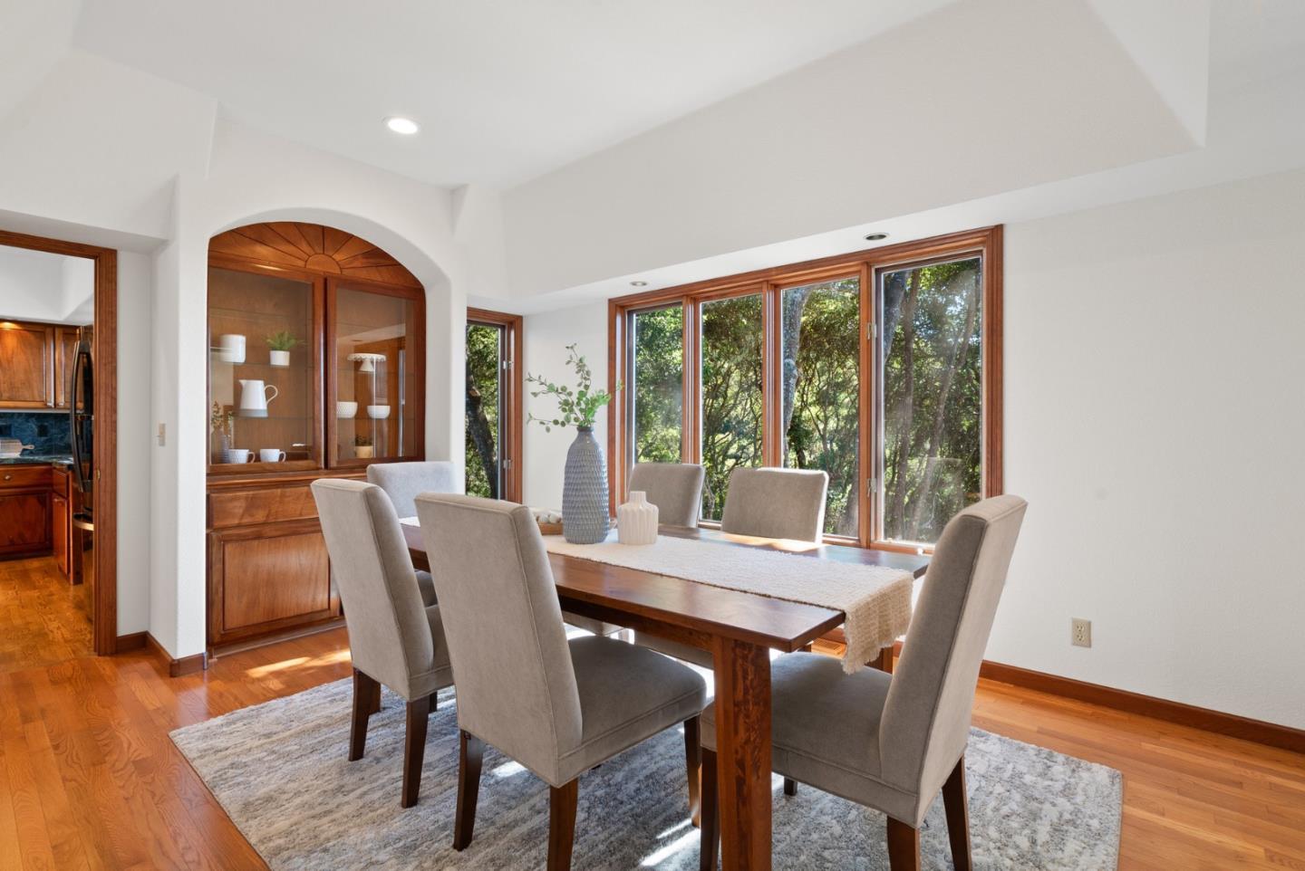 625 Quail Run Road Aptos, CA 95003 - Photo 12 of 49 a view of a dining room with furniture window and wooden floor