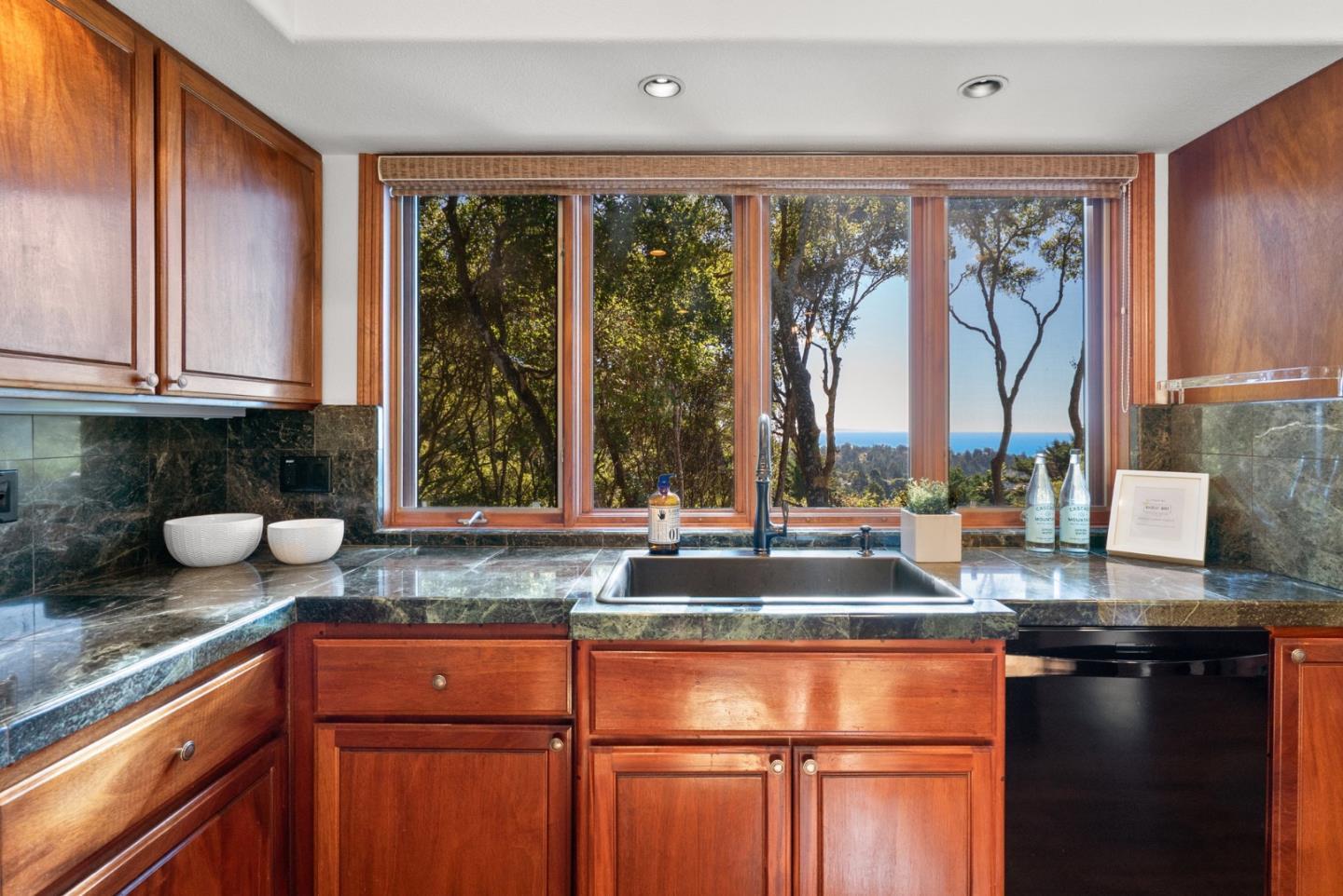 625 Quail Run Road Aptos, CA 95003 - Photo 15 of 49 a kitchen with granite countertop a sink and a window