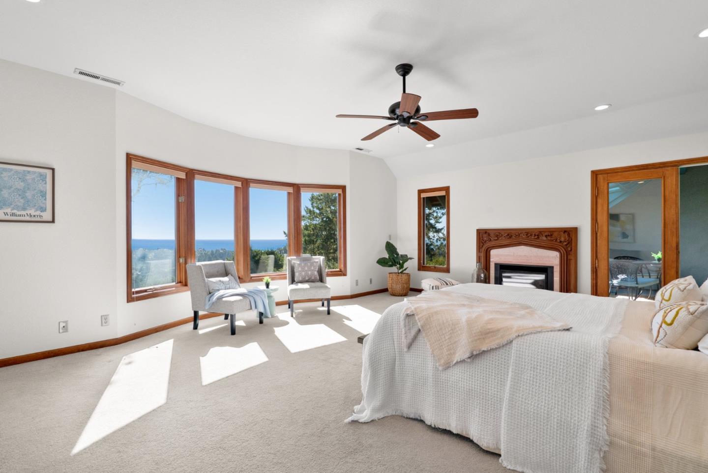 625 Quail Run Road Aptos, CA 95003 - Photo 20 of 49 a bedroom with a bed couch and large window